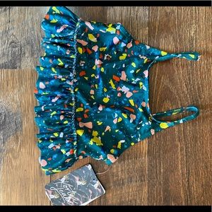 Brand new Kortni Jeane top size 10/11. Multi colored pattern.